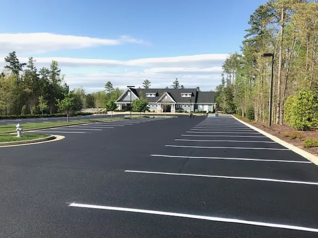After HOA project near Midlothian, VA, where Finley Asphalt & Concrete delivered a fresh, durable parking lot through expert sealcoating and attention to detail