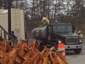 Read more about the article WATER TRUCK BEING LOADED WITH BENZENE SOLUTION AT THE V-DOT YARD FOR ROAD PRE-TREATMENT.