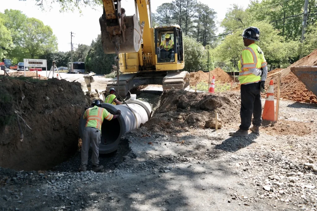 Excavator Digging for Pavement Work