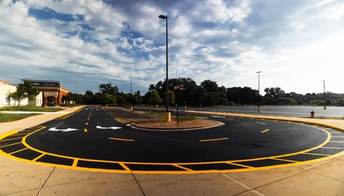 Commercial line stripping job with painted road