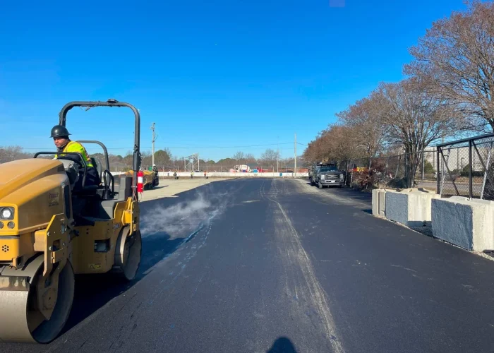 Steamrollers Smoothening Black Asphalt