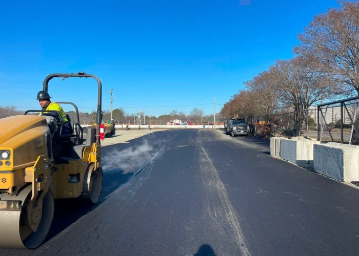 Steamrollers Smoothening Black Asphalt