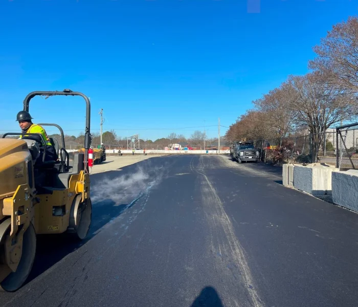 Steamrollers Smoothening Black Asphalt