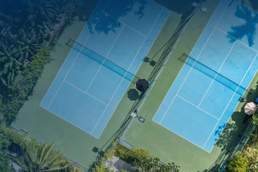Aerial view of newly paved/painted tennis court
