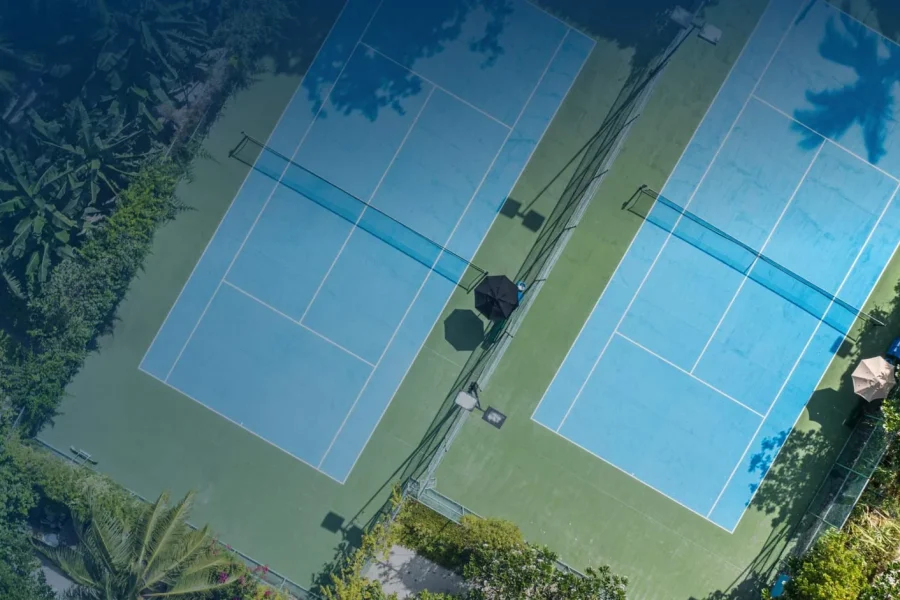 Aerial view of newly paved/painted tennis court